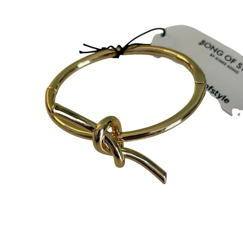 Song of Style Gold Tone Knot Cuff Bracelet.